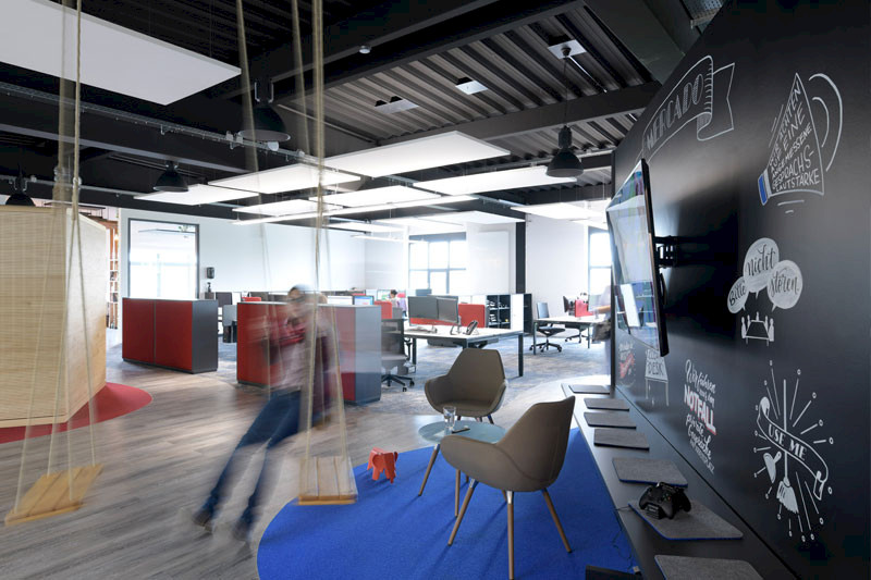 Wooden swings and game consoles are part of the furnishings.